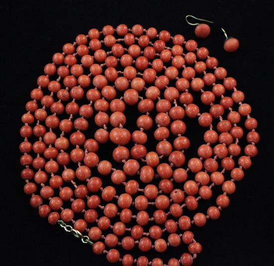 A single strand coral bead necklace & pair of earrings.